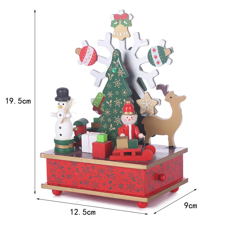 Christmas music box made of wood with carousel motif