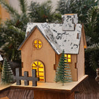 Illuminated wooden Christmas house with LED