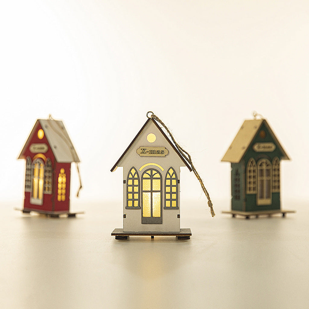 Illuminated wooden house for Christmas decoration