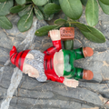 Gnome figure with red hat and hydrant motif