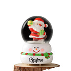 Small Christmas snow globe with light