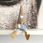 Decorative gnome with coffee cup