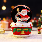 Christmas music box with glass sphere and snow effect