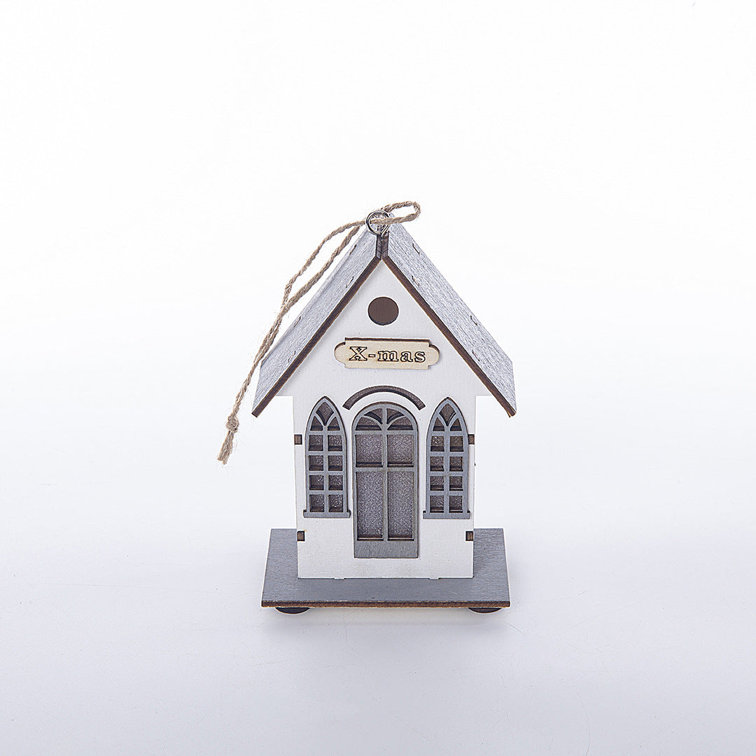 Illuminated wooden house for Christmas decoration