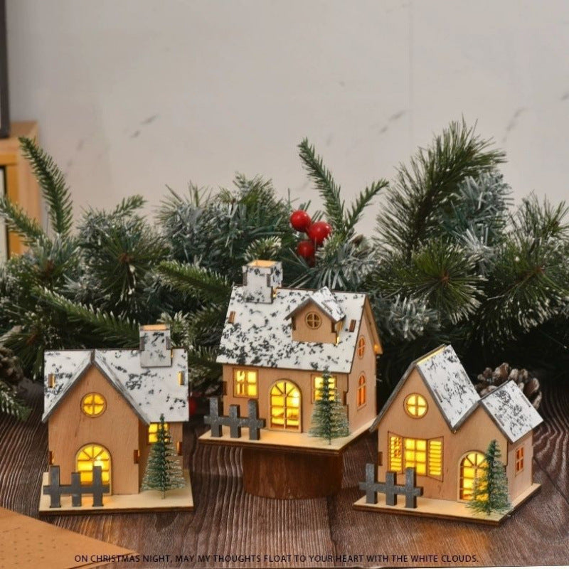 Illuminated wooden house for Christmas decoration