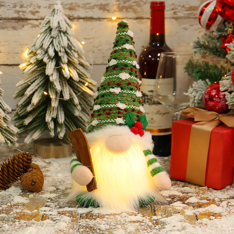 Illuminated gnome figure on the sled