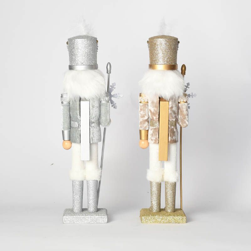 Decorative nutcracker figure made of wood with snowflake design