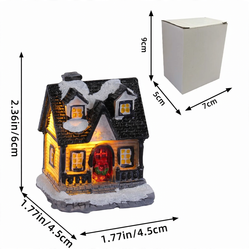 Illuminated houses made of resin for Christmas decoration