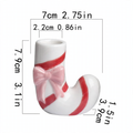 Ceramic candle holder in candy cane look