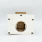 Illuminated wooden house for Christmas decoration