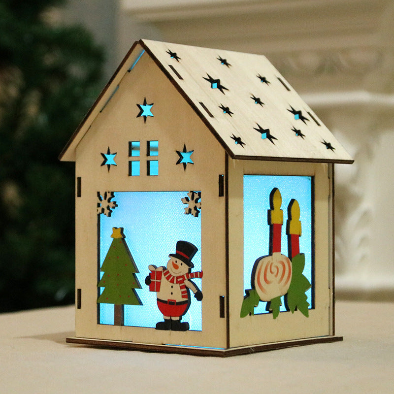 Illuminated wooden Christmas house, decorative