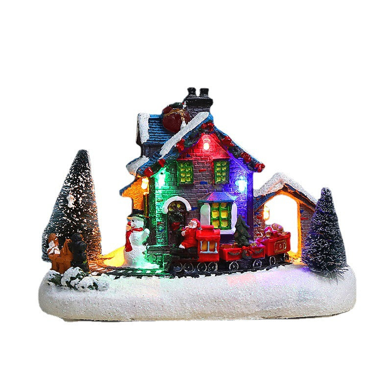 Illuminated Christmas village house made of resin