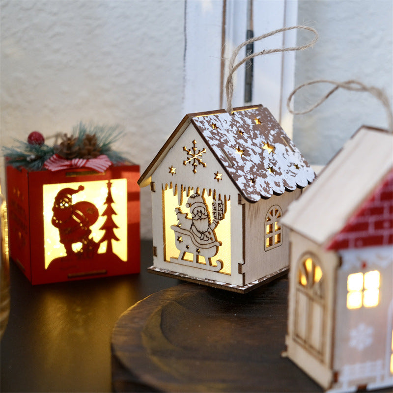 Illuminated wooden house, Christmas decoration for hanging or placing