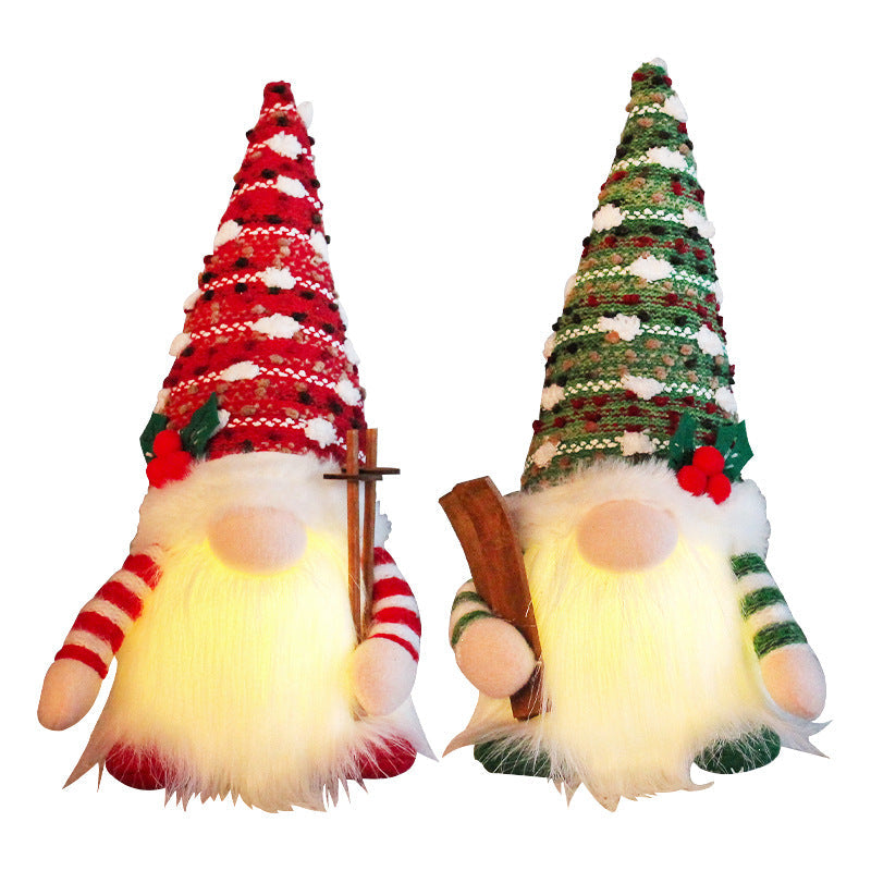 Illuminated gnome figure on the sled