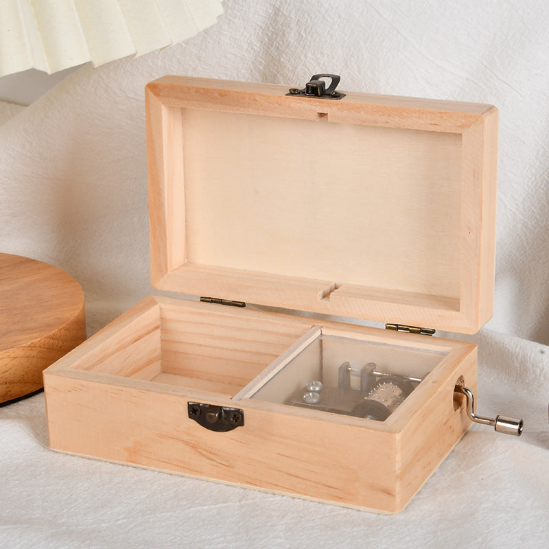 Wooden music box with hand crank, modern design