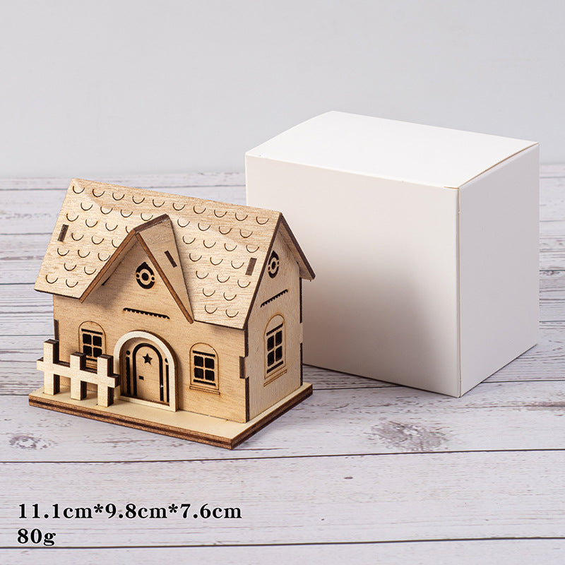 Illuminated wooden house for Christmas decoration