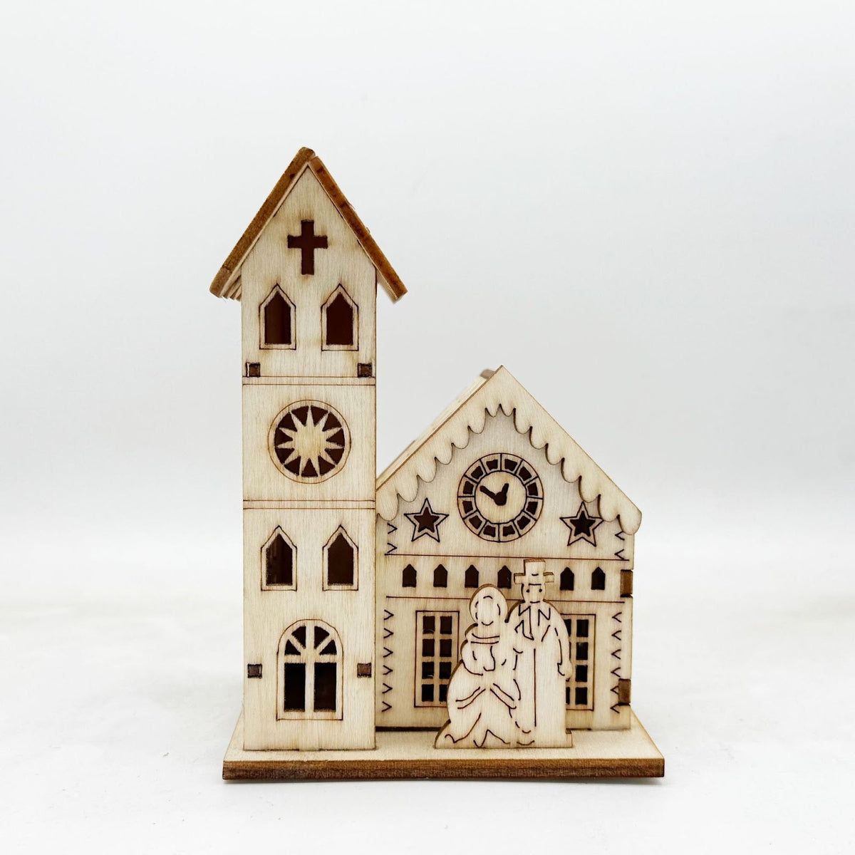Illuminated wooden house for Christmas decoration