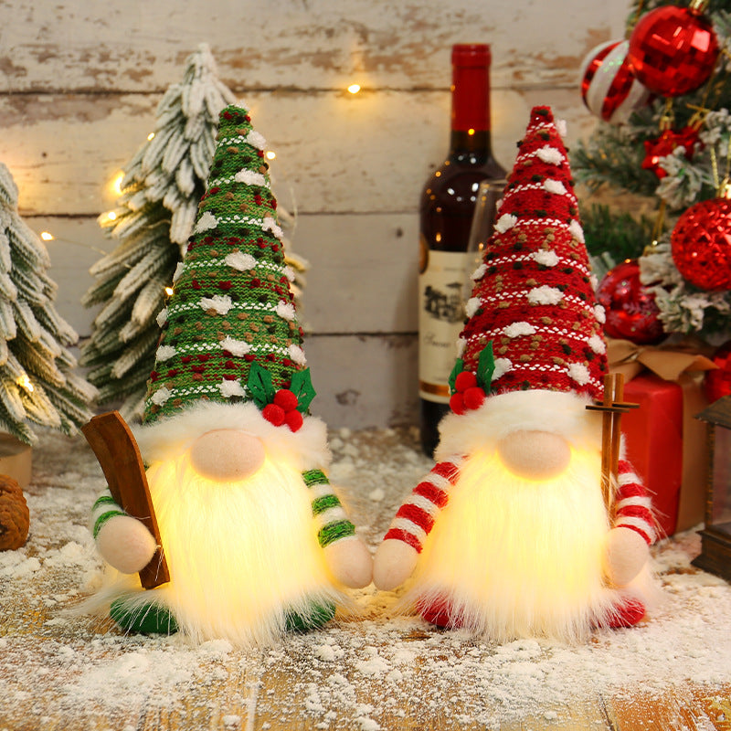 Illuminated gnome figure on the sled