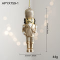 Golden nutcracker pendant made of resin for the Christmas tree