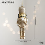 Golden nutcracker pendant made of resin for the Christmas tree