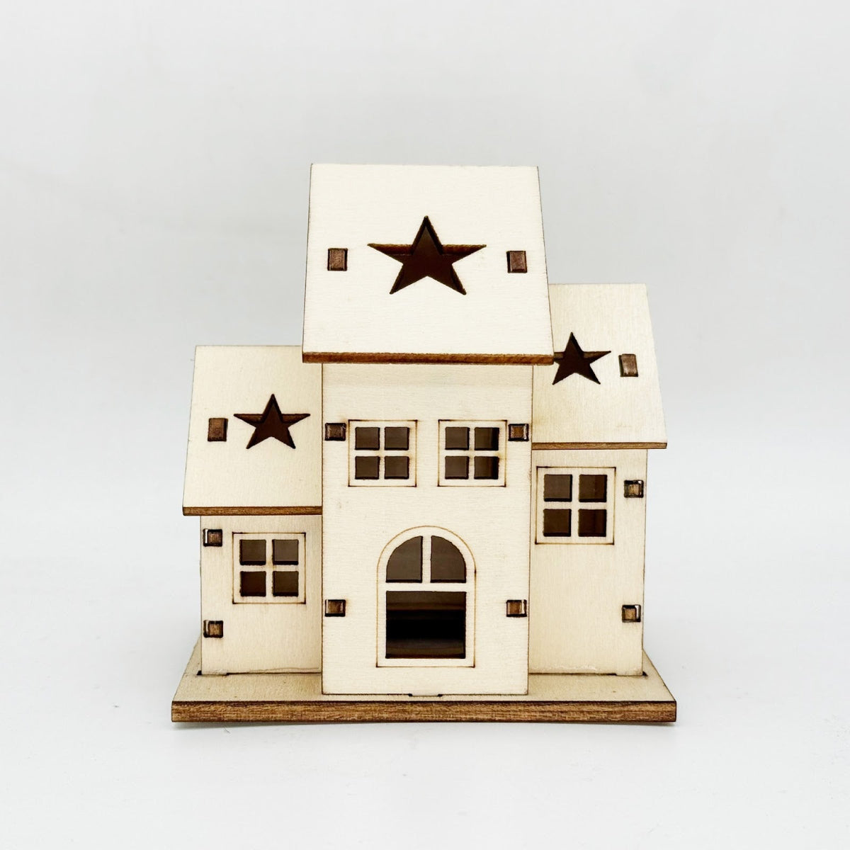 Illuminated wooden house for Christmas decoration