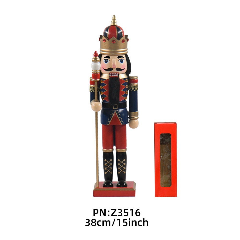 Decorative wooden nutcracker with cape