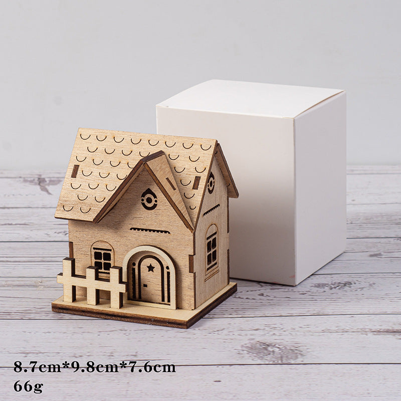 Illuminated wooden house for Christmas decoration