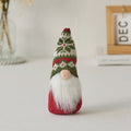 Christmas elf figure with snowflake hat