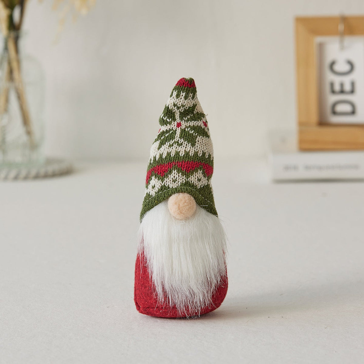 Christmas elf figure with snowflake hat