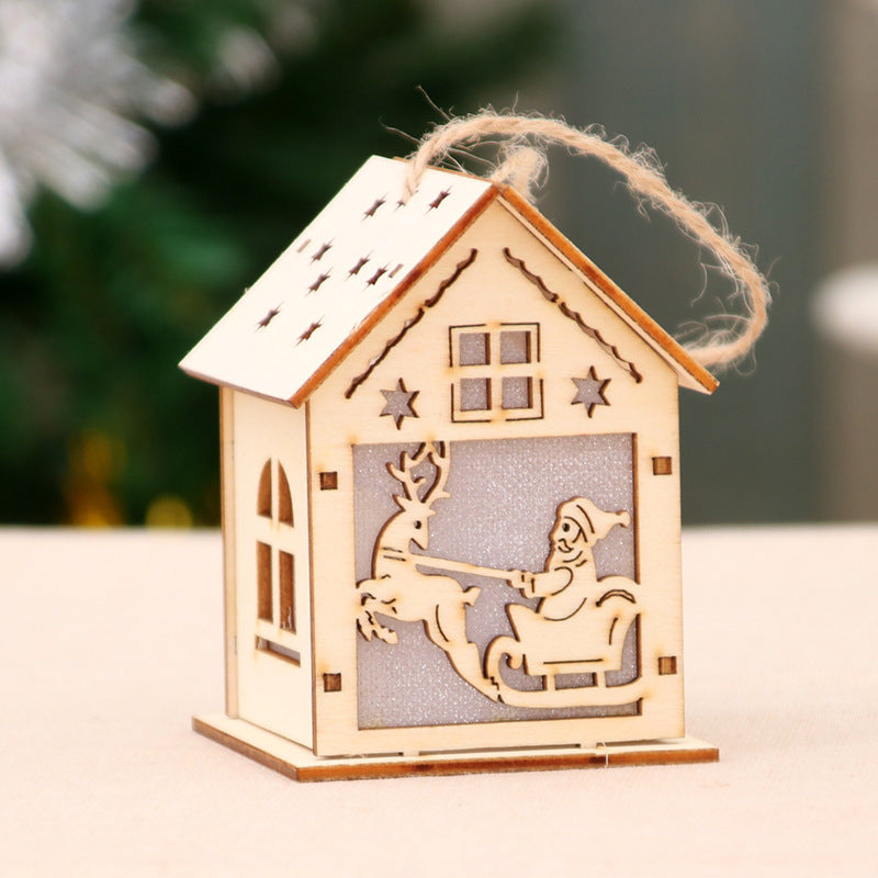Illuminated wooden Christmas house, decorative