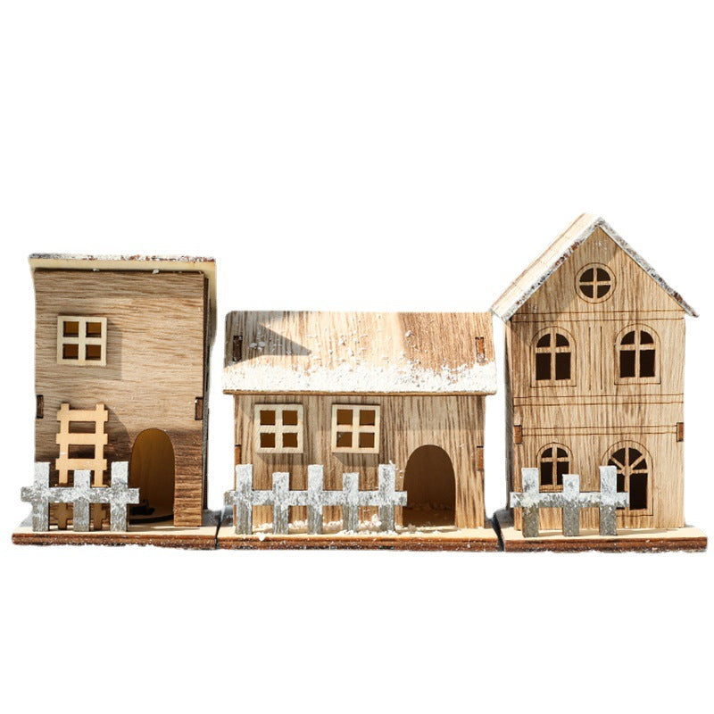 Illuminated wooden Christmas house in Scandinavian style