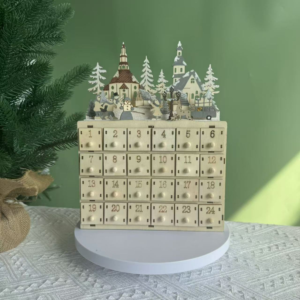 Christmas Advent calendar made of wood with 24 drawers