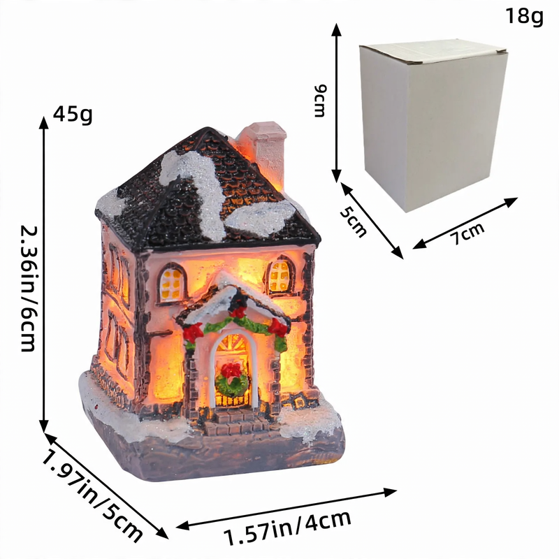 Illuminated houses made of resin for Christmas decoration