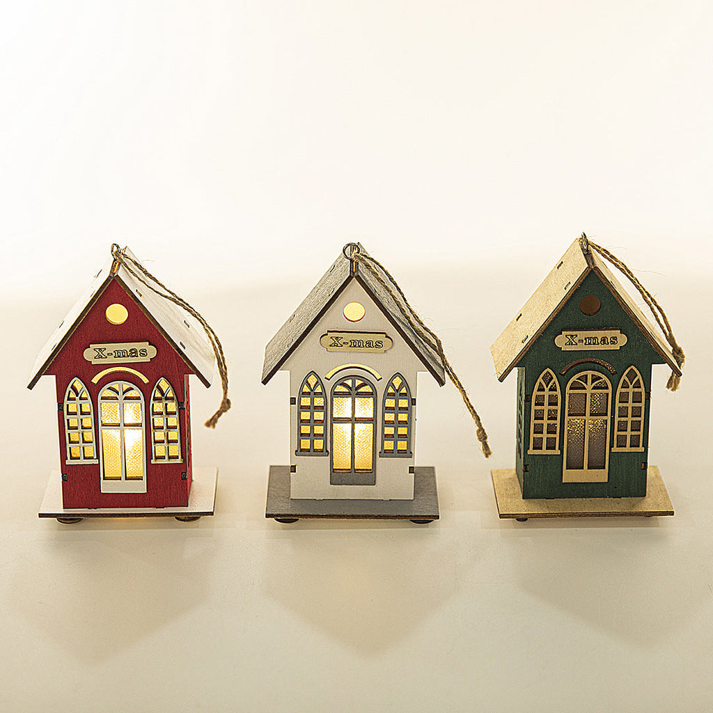 Illuminated wooden house for Christmas decoration