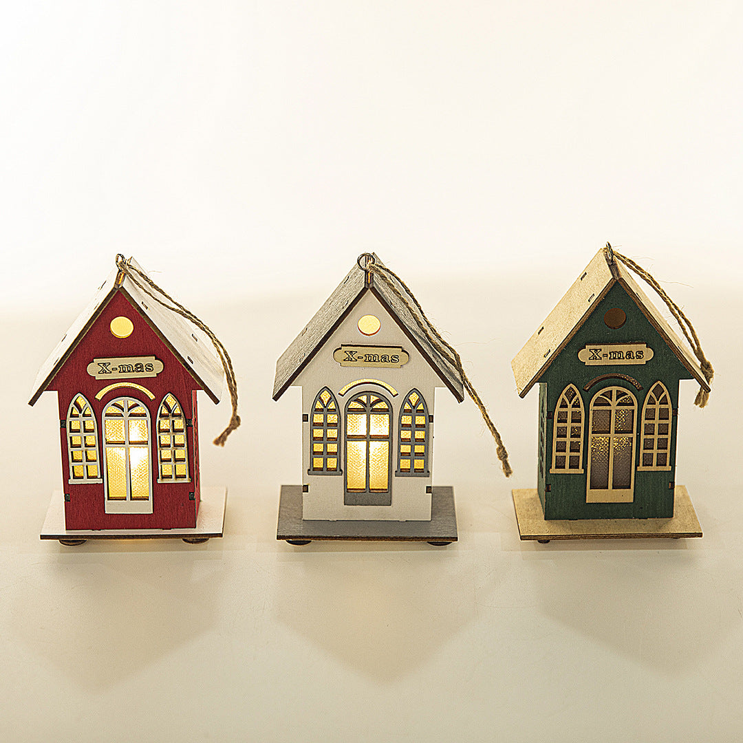 Illuminated wooden house for Christmas decoration