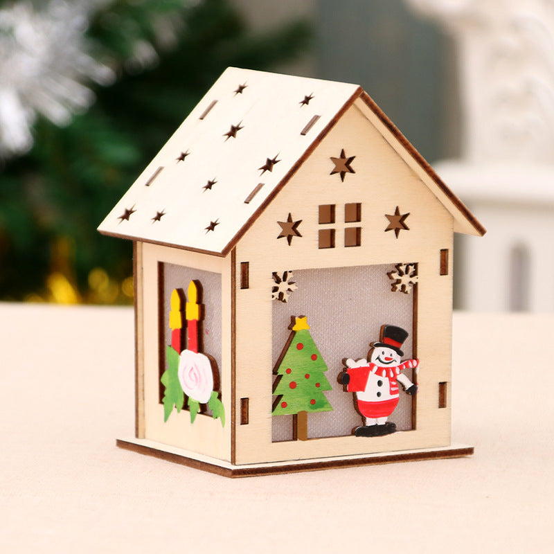 Illuminated wooden Christmas house, decorative