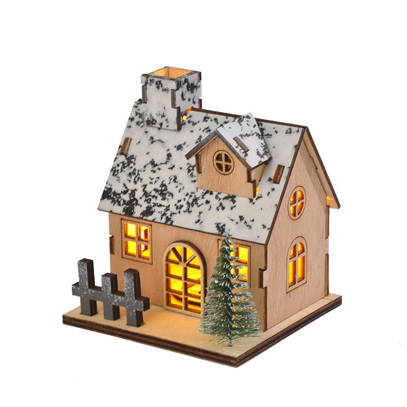 Illuminated wooden Christmas house with LED