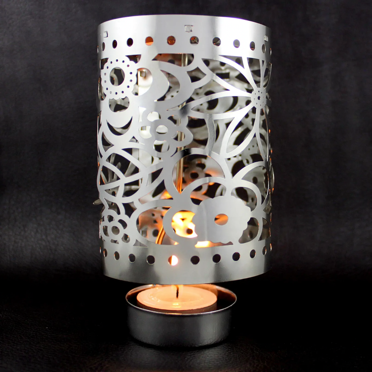 Rotating tealight holder made of brass, Christmas design