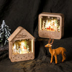 Illuminated wooden house with Christmas motif