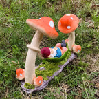 Garden decoration gnome in hammock made of synthetic resin