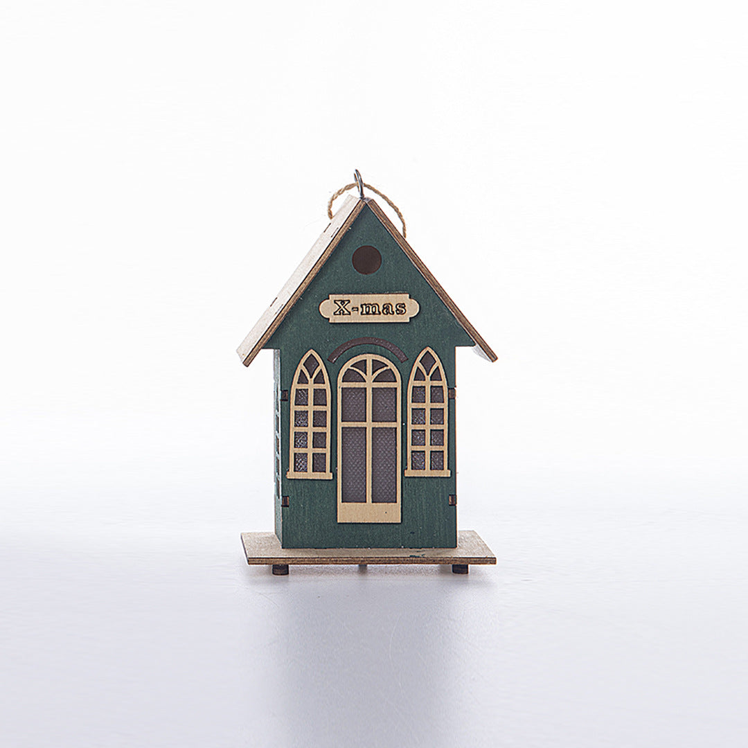 Illuminated wooden house for Christmas decoration