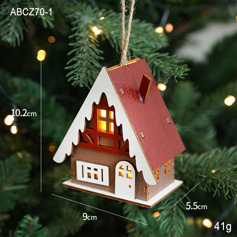 Illuminated wooden house for Christmas decoration
