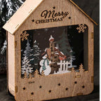 Illuminated wooden house with LED Christmas decoration