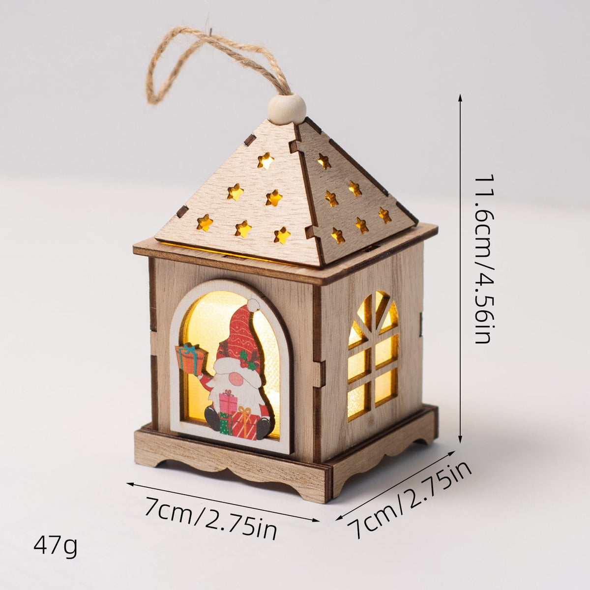 Illuminated wooden house as Christmas decoration