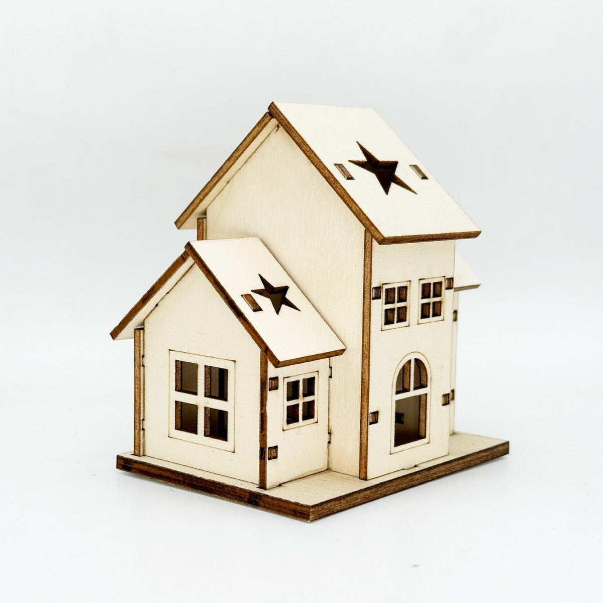 Illuminated wooden house for Christmas decoration