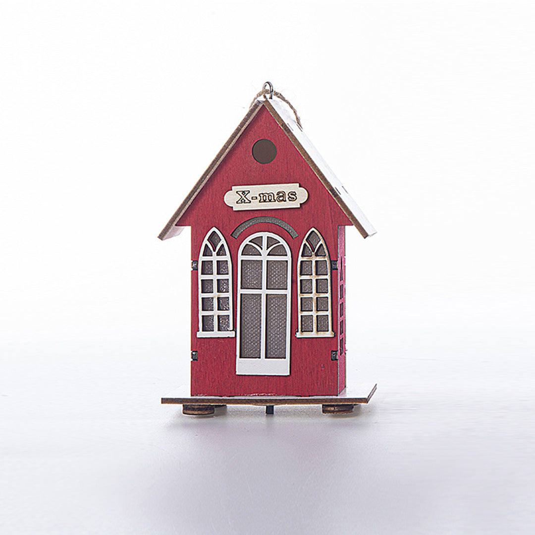 Illuminated wooden house for Christmas decoration