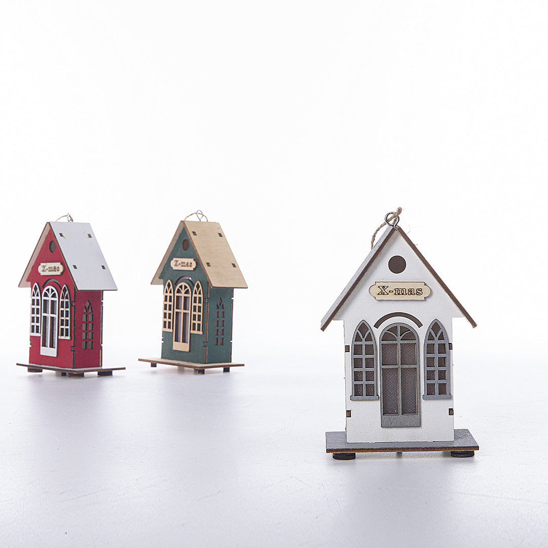 Illuminated wooden house for Christmas decoration