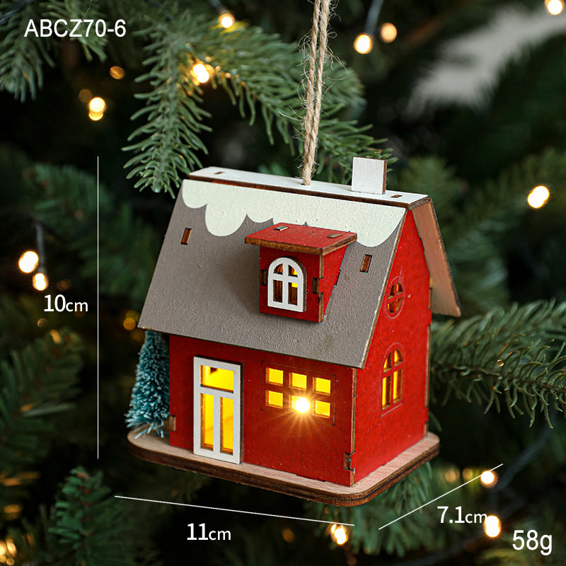 Illuminated wooden house for Christmas decoration