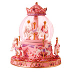 Decorative music box with snow globe and carousel