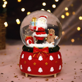 Illuminated snow globe music box with music